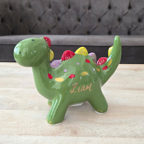 Green dinosaur piggy bank