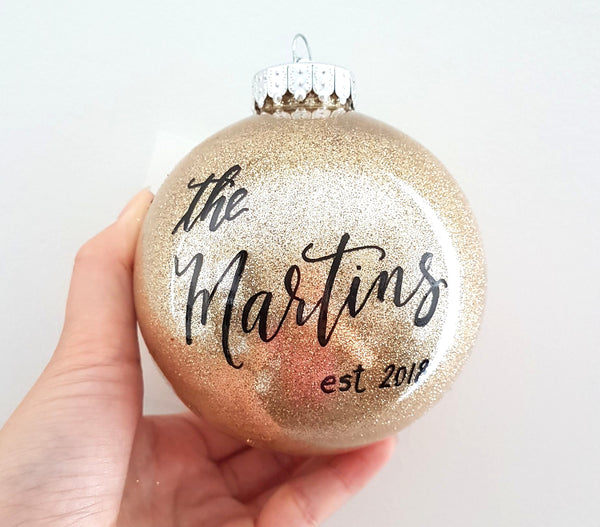 Gold Newlywed Christmas Ornament personalized with calligraphy